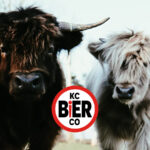 Two highland cows and a KC Bier CO logo